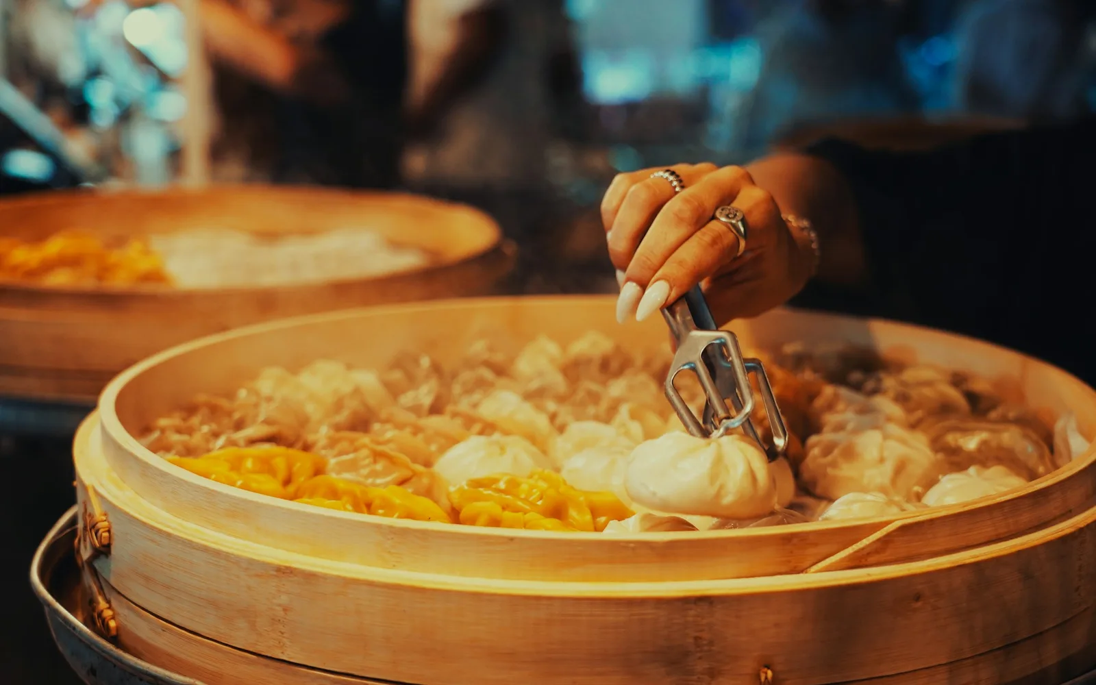 East Asian food — Dumplings folded in assembly lines, congee for sick days, and dishes that say what families don't.